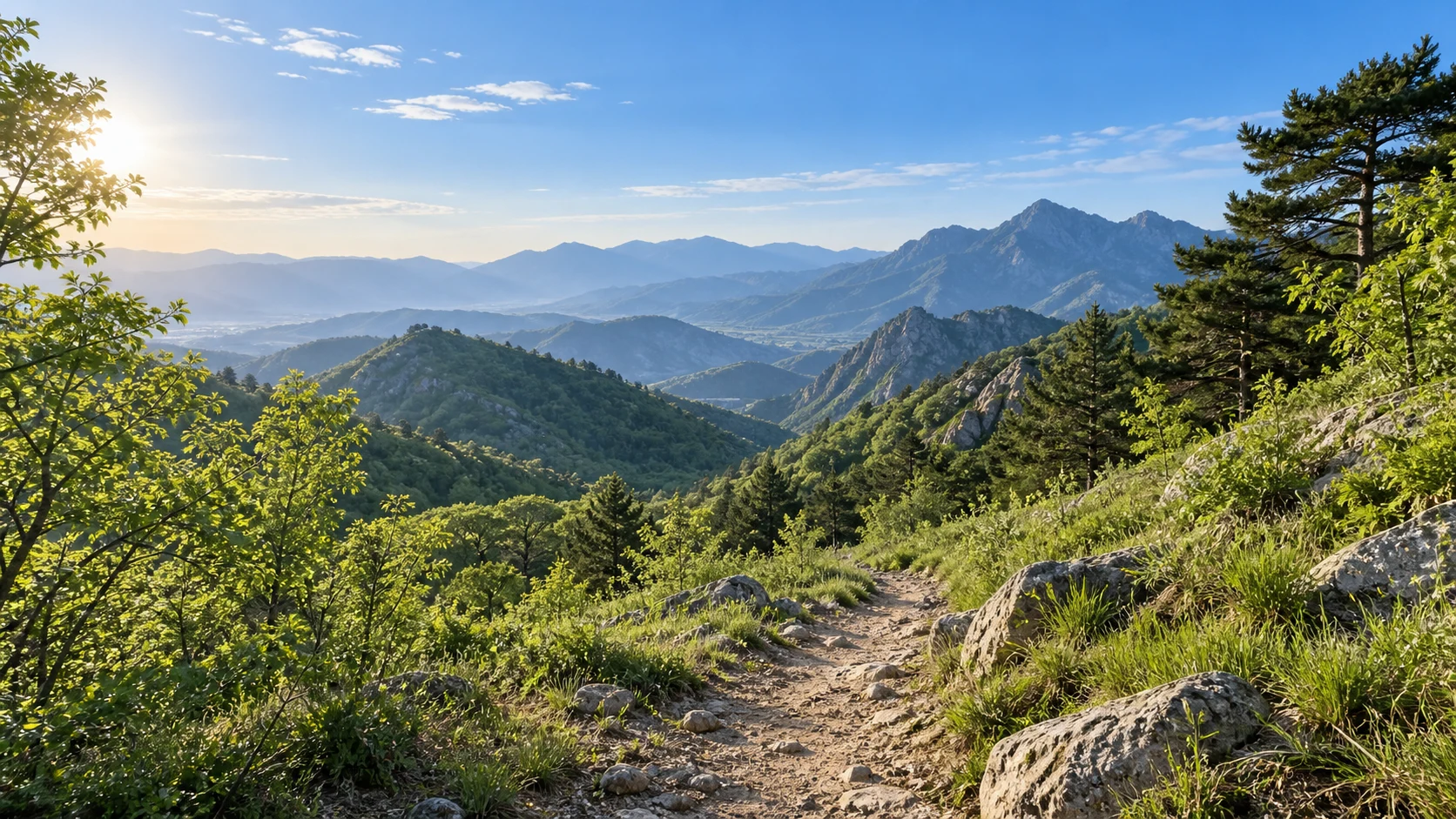 北京延庆地区五月下旬，华北山地低丘的落叶阔叶树林与松柏，初夏鲜绿的树叶和自然草坡，近景中央一条土石徒步径缓缓进入山谷，远景连绵北方山脊，明亮晨光与蓝天；花期未经证实所以不画盛开桃花，不画热带密林